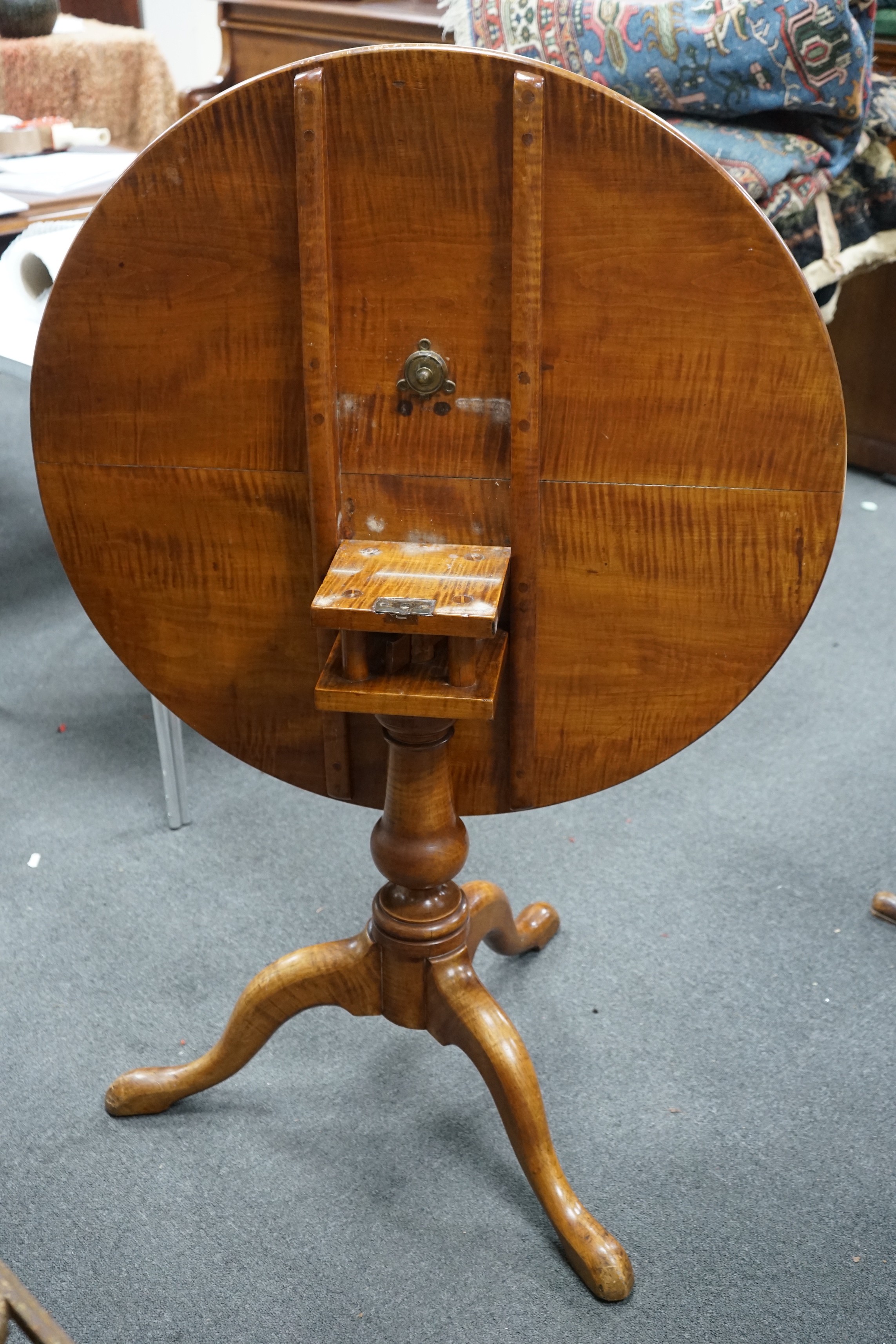 A Victorian circular satin birch tilt top tea table with bird cage action, diameter 84cm, height 70cm